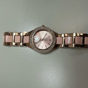Metaphor brand women’s watches,gold tone with crystals around and blush enamel
